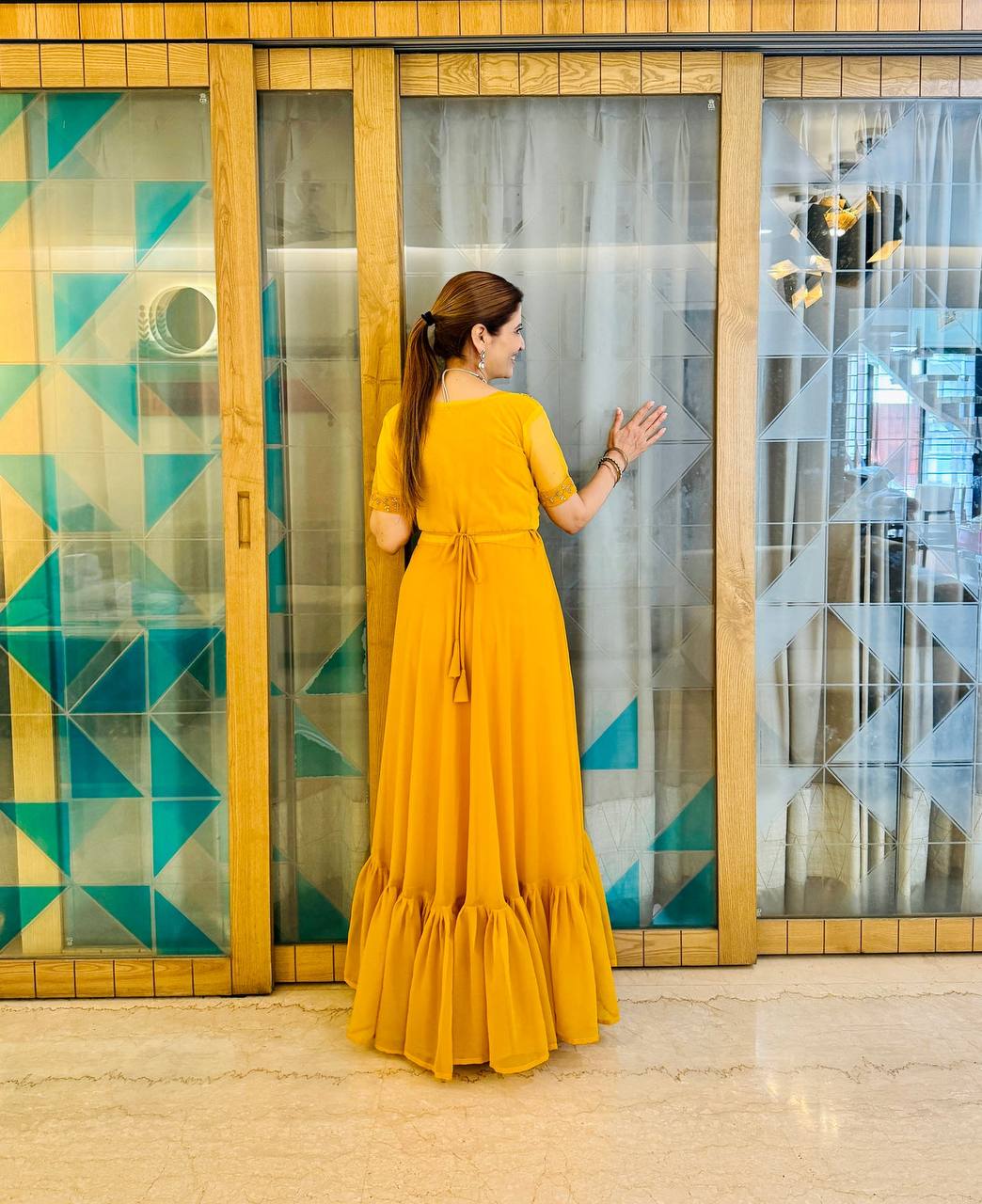 Faux Georgette Gown with Embroidered Koti & Belt
